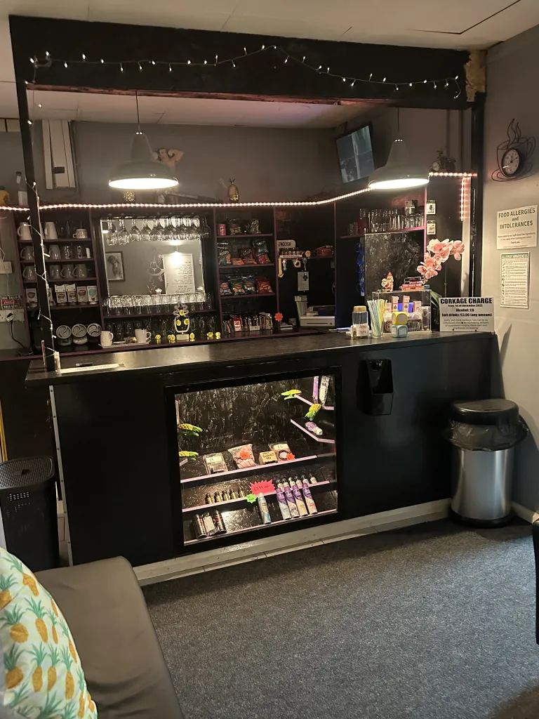 Bar and soft drinks counter at The Naughty Pineapple