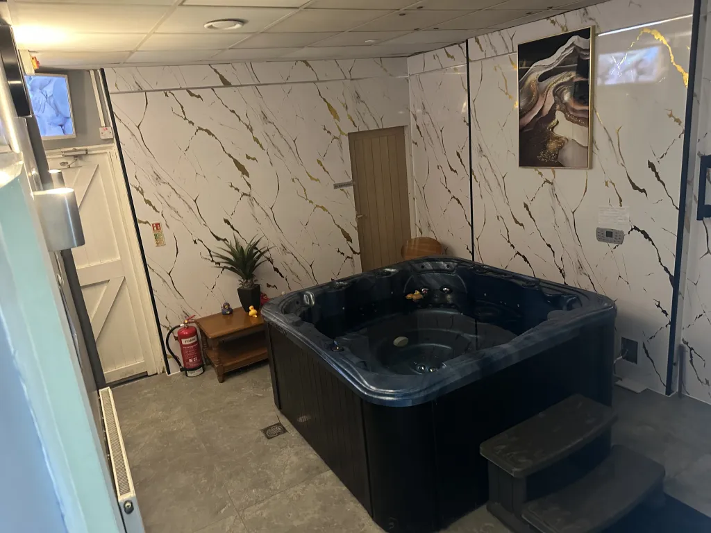 Hot tub area at The Naughty Pineapple